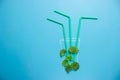 Green cocktail on blue background