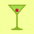 Green cocktail with cherries, ice cubes in a martini glass. Tequila drink Royalty Free Stock Photo