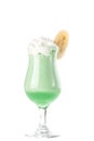 Green cocktail drink with whipped cream in tall glass isolated on white background Royalty Free Stock Photo