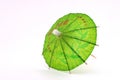 Green cocktail umbrella, top view Royalty Free Stock Photo