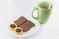 Green cofee cup and cookie Royalty Free Stock Photo