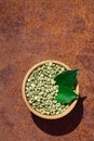 Green coffee beans in wooden bowl Royalty Free Stock Photo