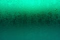 Green color gradation of beverage glass with condensation for texture background Royalty Free Stock Photo