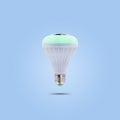 Green color LED energy saving lamp 230v on blue pastel color background Royalty Free Stock Photo