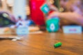 Green color pastel crayon on brown wooden table Royalty Free Stock Photo