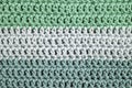 Green color shades, crochet rows, soft focus