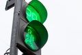 the green color of the traffic light with a timer allows pedestrians to cross Royalty Free Stock Photo