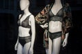 green color underwear with printed pajama on mannequin in fashion store showroom for women
