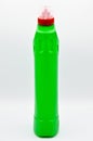 Green colored plastic detergent bottle. Cosmetic, container. Royalty Free Stock Photo