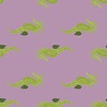 Green colored seahorse doodle ornament seamless pattern. Purple pastel background. Animal aquatic print