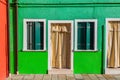 Green colorful house in Burano island near Venice, Italy. Venice postcard. Famous place for european tourism and travel Royalty Free Stock Photo