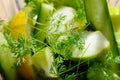 Green colour fruit and vegetables in a blender.