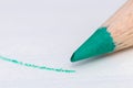 Green colour pencil with drawn line close up macro Royalty Free Stock Photo