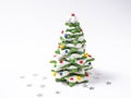 Green cookie christmas tree made by star cookie cutter on white background Royalty Free Stock Photo