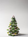 Green cookie christmas tree made by star cookie cutter on white background Royalty Free Stock Photo