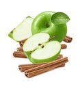 Green cooking apples and cinnamon sticks isolated on white background