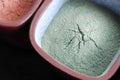 Green cosmetic clay powder Royalty Free Stock Photo