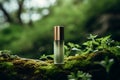 Green cosmetics, bottle of cosmetic serum or moisturizer on nature background. Organic natural ingredients beauty product among