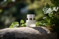 Green cosmetics, jar of cosmetic moisturizer cream on nature background. Organic natural ingredients beauty product among green