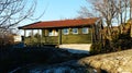 Green cottage on the rocks