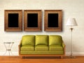 Green couch, table and standard lamp with frames Royalty Free Stock Photo