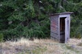 Wooden Cabin - Toilet in the woods in nature Royalty Free Stock Photo