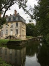 Green Countryside landscape, trees, lake, bridge. Courtomer, Normandy, France.