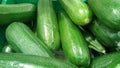 Green courgettes zucchini, close-up background.