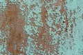 Green cracked painting on rusty metal surface Royalty Free Stock Photo