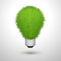 Green creative lightbulb isolated