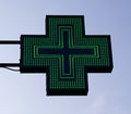 Green cross pharmacy sign. European pharmacy store. Royalty Free Stock Photo