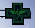 Green cross pharmacy sign. European pharmacy store. Royalty Free Stock Photo