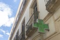 Green Cross Pharmacy Sign Illuminated with LED Lights Royalty Free Stock Photo