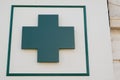 Green cross Pharmacy sign in street Royalty Free Stock Photo