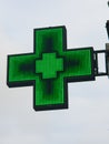Green Cross sign for a pharmacy Royalty Free Stock Photo