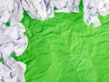 Green Crumpled paper background with crumpled paper ball Royalty Free Stock Photo