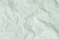 Green crumpled paper background, texture for web design screensavers Royalty Free Stock Photo