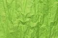 Green crumpled paper texture, grunge background