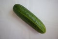 Green cucumber, fresh vegetables, kitchen background Royalty Free Stock Photo