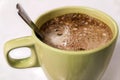 Green cup of coffee cappucino with foam on a white background. I Royalty Free Stock Photo