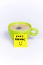 Green cup of coffee, organic coffee, post-it note good morning Royalty Free Stock Photo