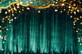 The green curtain made of luxurious velvet on the stage of the theater is fantastically glittering