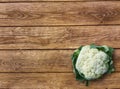 Green cut Organic cauliflower cabbage on wooden background