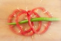 Green and cutted red pepper Royalty Free Stock Photo