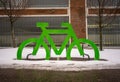 Green cycle installation marking a bicycle parking.. Royalty Free Stock Photo