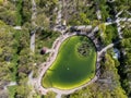 Green decorative pond in Kharkiv city central park Royalty Free Stock Photo