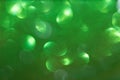 Green defocused flickering lights for text and background