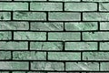 Green design aged brick wall texture - fantastic abstract photo background