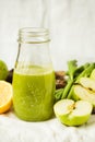 Green detox juice with apple, kale, lemon and celery Royalty Free Stock Photo