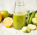 Green detox juice with apple, kale, lemon and celery, tinting Royalty Free Stock Photo